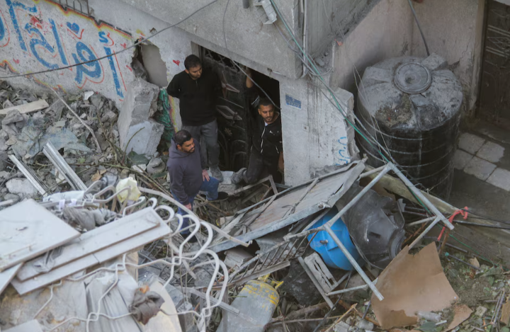 Devastation in Gaza: Israeli Strikes Kill 120, Hit Hospital, Ceasefire Talks Collapse