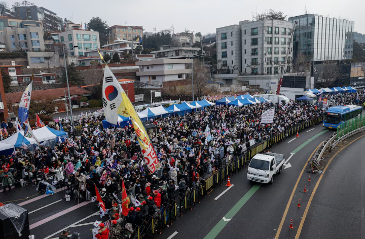 South Korea in Turmoil: Impeached President Yoon Defies Arrest Amidst Political Chaos